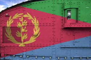 Eritrea flag depicted on side part of military armored tank closeup. Army forces conceptual background photo