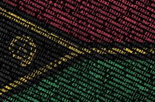 Vanuatu flag  is depicted on the screen with the program code. The concept of modern technology and site development photo