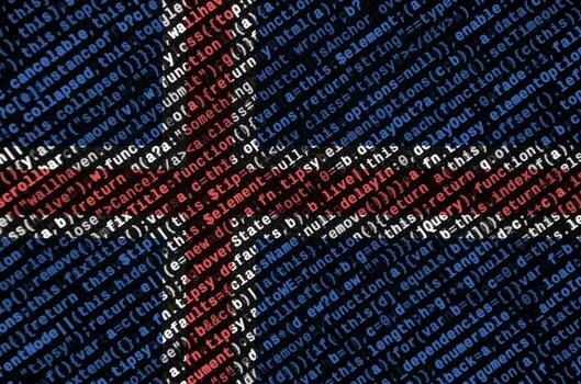 Iceland flag  is depicted on the screen with the program code. The concept of modern technology and site development photo