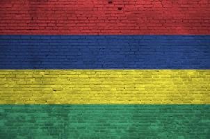 Mauritius flag depicted in paint colors on old brick wall. Textured banner on big brick wall masonry background photo