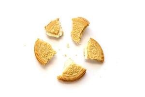 TERNOPIL, UKRAINE - MAY 28, 2022 Oreo golden crispy cookie on white background. The brand Oreo is owned by company Mondelez international photo