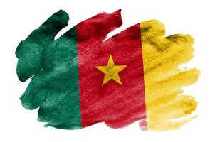 Cameroon flag  is depicted in liquid watercolor style isolated on white background photo