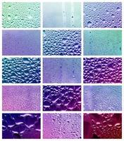 un collage de muchos fragmentos diferentes de vidrio, decorado con gotas de lluvia del condensado. tonos morados y violetas foto