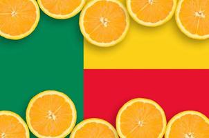 Benin flag  in citrus fruit slices horizontal frame photo