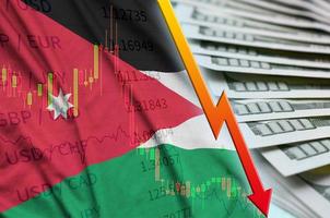 Jordan flag and chart falling US dollar position with a fan of dollar bills photo