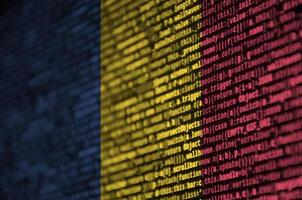 Chad flag  is depicted on the screen with the program code. The concept of modern technology and site development photo