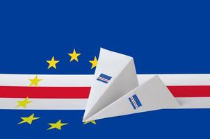 Cabo verde flag depicted on paper origami airplane. Handmade arts concept photo