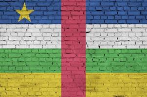 Central African Republic flag is painted onto an old brick wall photo