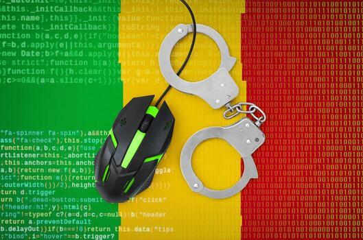 Mali flag  and handcuffed computer mouse. Combating computer crime, hackers and piracy photo