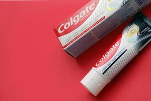 TERNOPIL, UKRAINE - JUNE 23, 2022 Colgate toothpaste, a brand of oral hygiene products manufactured by American consumer-goods company Colgate-Palmolive photo