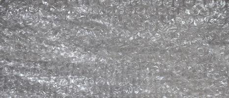 White bubble Wrap Packing Or Air Cushion material. Abstract Texture For Creative Art Work, Close Up dfckground, Top View with Copy Space photo