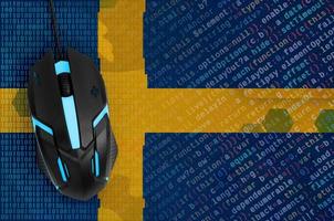 Sweden flag  and computer mouse. Digital threat, illegal actions on the Internet photo