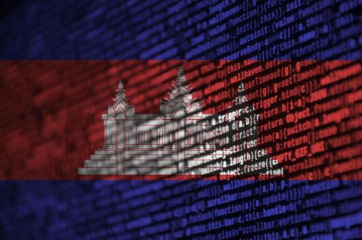 Cambodia flag  is depicted on the screen with the program code. The concept of modern technology and site development photo