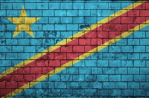 Democratic Republic of the Congo flag is painted onto an old bri photo