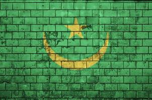 Mauritania flag is painted onto an old brick wall photo