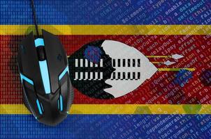 Swaziland flag  and computer mouse. Digital threat, illegal actions on the Internet photo