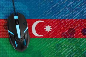 Azerbaijan flag  and computer mouse. Digital threat, illegal actions on the Internet photo