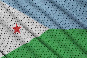 Djibouti flag printed on a polyester nylon sportswear mesh fabri photo