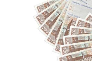 200 Croatian kuna bills lies isolated on white background with copy space. Rich life conceptual background photo