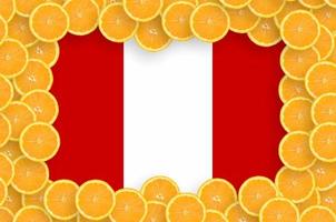 Peru flag  in fresh citrus fruit slices frame photo