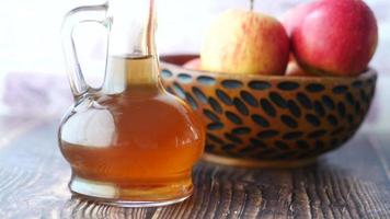 Apple cider vinegar, apple juice, a bowl with apples video