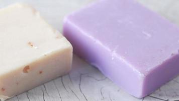 White soap next to purple video