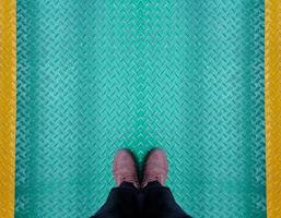 Man standing on the ground epoxy. copy space. photo