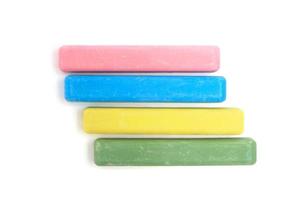 Set of colored chalk white background,yellow, blue, pink and green.