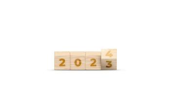 Flipping the 2023 to 2024 year numbers calendar on wooden cube blocks for new year change, starting new things or new business. 2024 happy new year concept banner. 3D illustration. photo