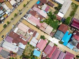 east kutai, east Kalimantan, Indonesia, 2022 - Aerial view of Situation Flood in . Floods hit homes and highways, disrupting transportation, floods because high rainfall. photo