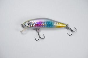 Plastic fishing lure on a white background, Lure minnow photo