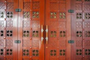 Islamic carved door in the mosque in Al Faruq Mosque, Sangatta, East Kalimantan, Indonesia. photo