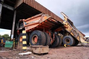 East Kutai, East Kalimantan, Indonesia, 2022 - Mining Dump Truck Maintenance at technical services box. photo
