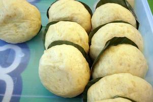 Bakpao  Indonesian Traditional Bun Cake inside the plastic box container. Street Food photo