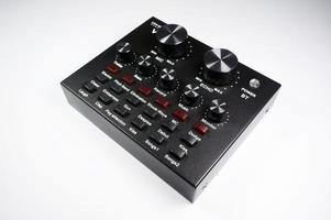 Sangatta, East Kutai, East Kalimantan, Indonesia,2020 - TAFF STUDIO audio soundcard  with faders and adjusting knobs,with selective focus. photo