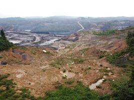 East Kutai, East Kalimantan, Indonesia, 2022 - Arial View of open pit coal mining photo