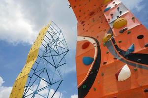 Cliff climbing practice wall, Rock climbing wall photo