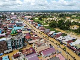 east kutai, east Kalimantan, Indonesia, 2022 - Aerial view of Situation Flood in . Floods hit homes and highways, disrupting transportation, floods because high rainfall. photo