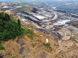 East Kutai, East Kalimantan, Indonesia, 2022 - Arial View of open pit coal mining photo