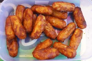Gemblong or gem-blong is a kind of traditional Indonesia. It is made from glutinous rice flour coated with palm sugar caramel. photo