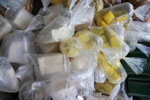 white and yellow tofu being sold in the traditional market, Sangatta, East Kalimatan-indonesia. photo