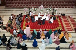 Sangatta, East Kalimantan, Indonesia, 2020 - Islamic marriage contract at the Al faruq mosque. An Islamic marriage contract is an Islamic prenuptial agreement. photo