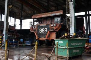 Sangatta, East kutai, East Kalimantan, Indonesia, 2022, Mining Dump Truck Maintenance at technical services box. photo