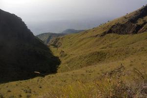 View from the merbabu mountain hiking trail. Central Java, Indonesia photo