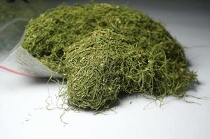 Green Gayo Tobacco. Tobacco from aceh-Indonesia. The uniqueness of this product that makes it different from other tobaccos, is the aroma and taste of smoking which is similar to marijuana. photo