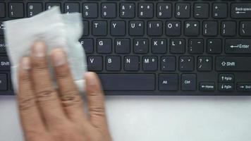 Wiping off laptop keyboard video