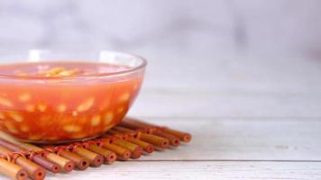 A bowl of red sauce gnochhi video