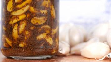 A jar of garlic sauce, garlic preserve video