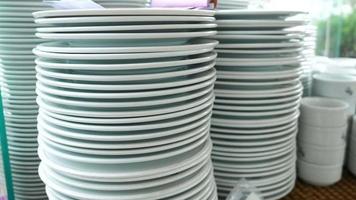Piles of plates in restaurant video