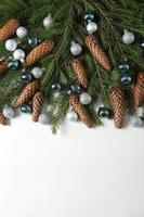 Holidays greeting card or banner composition with pine tree branches. Merry Christmas background and Happy New Year 2023. photo